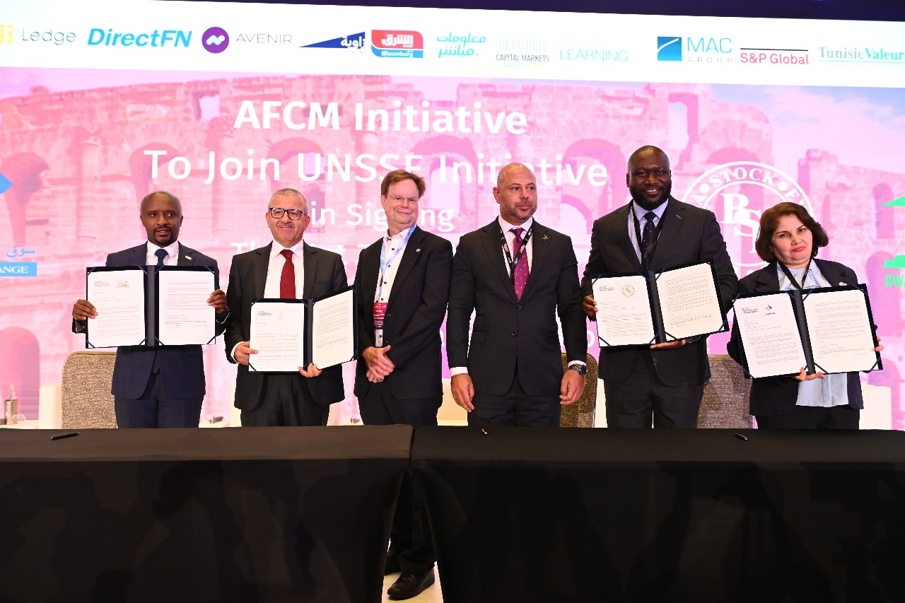 Signing at AFCM Conference